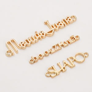 Purse Hat Accessories <strong>Custom</strong> <strong>Metal</strong> <strong>Clothing</strong> <strong>Labels</strong> Swimwear Sewing <strong>Metal</strong> Garment <strong>Labels</strong> Gold <strong>Metal</strong> Letters Logo For Clothes - Product Image 1