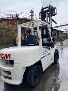 Chariot élévateur diesel d'occasion Vigoshop TCM FD50 testé professionnellement avec mât multi-étages, prêt à l'emploi sur site - Product Image 5