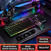 Clavier, souris et tapis de souris filaires 3 en 1 avec rétroéclairage arc-en-ciel pour accessoires informatiques en gros