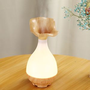 <span class=keywords><strong>Diffusore</strong></span> di Aromi a Ultrasuoni a Forma di Vaso di Loto, Umidificatore a Nebbia Fredda <span class=keywords><strong>con</strong></span> Luce LED Calda Effetto Legno, Regalo per la Casa, Personalizzazione Logo all'Ingrosso - Product Image 3