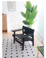 Fauteuil lounge surdimensionné en bois Baisheng, capitonné en cuir véritable, ergonomique, écologique, style nordique moderne, pour hôtel et salon