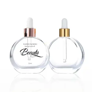 cosmetics packaging containers luxury flat round serum dropper bottle 50ml empty transparent glass essential oil bottles