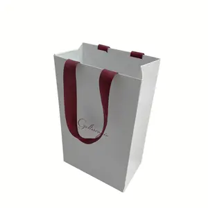 OEM производитель упаковки с логотипом на заказ белая текстура причудливая бумажная Подарочная сумка с тканевой ручкой