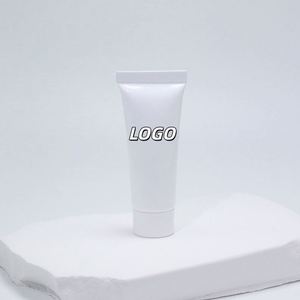 Tube de rouge à lèvres en plastique personnalisé avec bouchon à vis doré/argenté, tube rond pour emballage souple compressible - Product Image 1