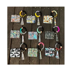 Offre Spéciale Style occidental porte-carte sac léopard portefeuille bracelet bracelet Silicone perles Bracelet portefeuille porte-clés