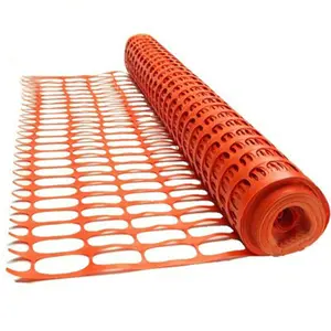 Orange safety net in a road construction site