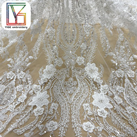 Nouveau design de tissu en dentelle française brodée, tissu en dentelle perlée, tissu en dentelle à paillettes pour robes de mariée pour femmes