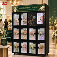 Distributeur automatique intelligent de fleurs fraîches réfrigérées à 10 compartiments avec écran tactile, paiement par carte et billets pour la vente de bouquets 24h/24 et 7j/7