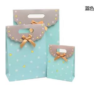 Sacs en papier blancs de luxe personnalisés avec poignées en ruban pour mariage, bonbons, cadeaux, logo personnalisé, écologiques, pour vêtements et chaussures - Vente en gros - Product Image 4