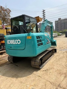 Mini-excavatrice Kobelco SK60 avec godet de terrassement d'une capacité de 0,12 m³, poids opérationnel de 6 tonnes, moteur Kawasaki, modèle Geospec - Product Image 4