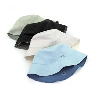Özel etiket tasarımcı kova şapka özel serin duygu kumaş kova şapka balıkçı kova şapka için çift taraflı kap