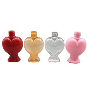 Chai Mỹ Phẩm Tinh Dầu Màu Cam Đỏ Hồng Trong Suốt Tùy Chỉnh 100Ml Bằng Nhựa Hình Trái Tim PET - Product Image 1