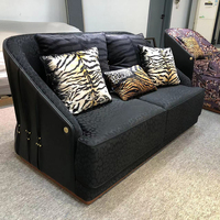 Vente en gros d'usine de meubles modernes et luxueux au design scandinave canapé en cuir véritable fauteuils de loisirs en cuir noir