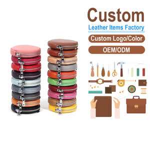 Porte-monnaie rond en cuir véritable avec fermeture éclair, options multicolores, fabrication OEM/ODM sur mesure, pochette compacte pour écouteurs - Product Image 1