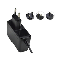 Adaptador de Corriente CA/CC de Pared de 12 V 1.3 A 15.6 W con Enchufe para EE. UU., UE, Reino Unido y Australia, Cable de 5.5*2.1 1.2 M, OVP, OCP, SCP, Mini Refrigerador, Bomba de Aire, Ventilador, CE, FCC, RoHS, OEM