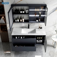 Meuble-lavabo mural moderne avec armoire en ardoise, miroir LED, vasque en céramique et évacuation en cuivre pour hôtel ou appartement