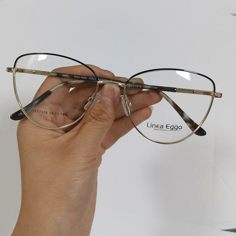 Montatura ottica in metallo a forma di occhio di gatto per donne montature  per occhiali da vista stock stock per gatti in metallo inox