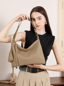 New Arrivals woman <b>handbags</b> wholesale trendy <b>handbags</b> for women luxury designer genuine leather with mini bag charm - Product Image 1