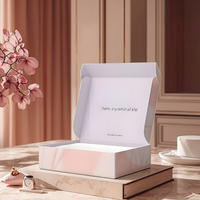 Boîte d'expédition en carton ondulé personnalisée en gros pour cosmétiques et parfums, en encre de soja, rose et bleue, avec gaufrage et doublure en éponge