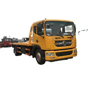 Буксировочный грузовик повышенной проходимости желтого цвета на 9 тонн с платформой