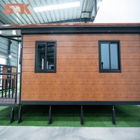 Maison modulaire préfabriquée en conteneur, prix d'usine, personnalisée, 2 chambres, 1 salon avec véranda et auvent, imperméable