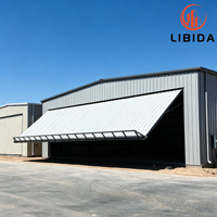 Hangar métallique préfabriqué à portée libre, conception personnalisée pour le stockage d'avions privés et l'atelier de services aéroportuaires