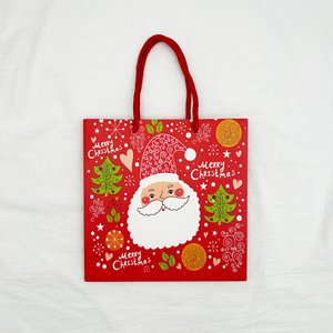 Sacs fourre-tout en papier kraft personnalisés pour Noël avec des motifs de flocons de neige, d'arbres et de rennes pour l'emballage de cadeaux - Product Image 5