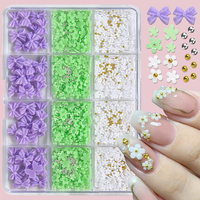 12 compartiments de breloques et accessoires pour nail art en résine, strass, fleurs, nœuds, billes en acier et pierres de diamant, couleurs violet, blanc, vert