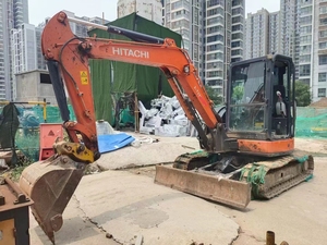 Excavatrice Hitachi ZX65 d'occasion, fabriquée au Japon, 7 tonnes, sur chenilles, certifiée CE, avec accessoire de pince, attache rapide et brise-roche - Product Image 3