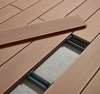 Revêtement de sol imperméable extérieur en bois WPC Revêtement de sol en bois Plastique WPC Revêtement de terrasse 3D en bois composite co-extrusion de grain de bois