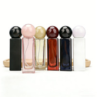Vente en gros de flacons de parfum portables de luxe personnalisés et rechargeables en verre de 30 ml pour les soins de la peau