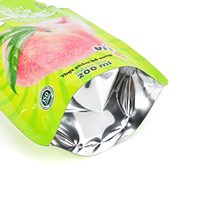 Op maat gemaakte logo bedrukte aluminiumfolie PET rietjeszakje vloeibare vruchtensap verpakking Doypack staande zak plastic zak met rietje