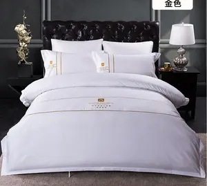 Ensembles de literie blancs de luxe pour hôtel ensembles de draps de lit king avec logo personnalisé et taie d'oreiller housse de couette drap plat