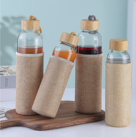 Gobelet à eau en verre isolé résistant à la chaleur moderne de 500 ml, très vendu, réutilisable, avec couvercle en bambou à visser, housse en lin, anti-fuite