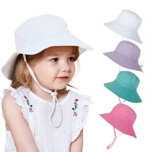 Toptan düz baskılı yaz pamuk özel Logo UPF 50 + plaj bebek güneş şapkası kablosu ile okul kayış çocuk geniş ağızlı kova şapka