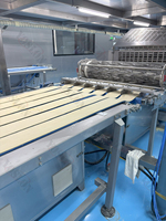 Ligne de production automatique de croissants de table YOSLON machine à rouler le pain croissant machine à former le pain croissant à vendre