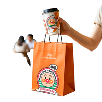 Sac en papier kraft recyclable de qualité alimentaire de luxe personnalisé avec poignées torsadées et impression flexographique pour l'emballage du café