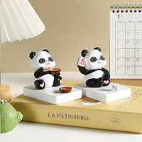Nouveaux produits 2024 yiwu panda artisanat panda ornements ornements de jardin sculpturaux support de support de téléphone portable décoration de la maison