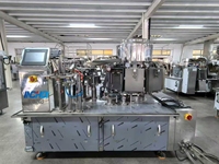 Machine d'emballage sous vide automatique électrique à alimentation par sac Machine d'emballage sous vide rotative pour sachet pour tofu séché