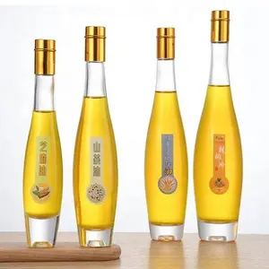 Fancy Clear Round Kitchen Glass Olive Oil Bottle Small Glass Bottles For Oils With Golden Lids