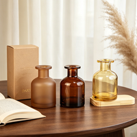Bouteille diffuseur à roseaux en verre ambré mat dépoli, avec bouchon en liège arrondi de luxe, pour huiles aromatiques et parfums, vente en gros