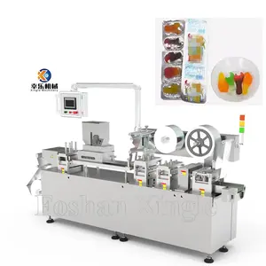 Low Cost Flat Plate Commodity chocolate candy Packaging Chewing Gum Blister Packing Machine For Capsule