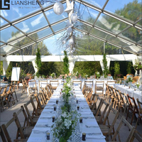 Tente de Réception de Luxe Mariage PVC Transparent Châssis Noir Grande Tente Courbe à Chevrons Couleur au Choix Structure Aluminium Acier pour Événements