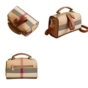 Sac à main élégant en toile pour femme, avec bandoulière réglable, accents dorés, intérieur spacieux et fermeture éclair – Commande en gros RTS - Product Image 1