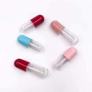 Vente en gros de tubes de gloss à lèvres vides ovales en plastique, personnalisables, avec couvercle noir, mignons et économiques, pour emballage de gloss à lèvres - Product Image 4