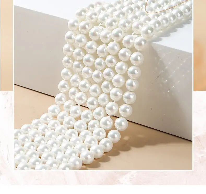 Wholesale and direct supply of Nanyang white shell pearls by popular manufacturers 22-20mm straight hole shell pearls DIY jewel