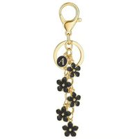 Charm de sac à fleurs personnalisé mignon et élégant de 26 lettres et porte-clés de téléphone pour les étudiantes