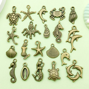 Colgante Antiguo de Aleación de Zinc con Diseño de Sirena y Delfín para Accesorios de Joyería DIY, Fornituras de Tortuga, Estrella de Mar, Caballito de Mar y Concha - Product Image 1