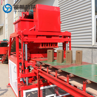 Machine à Briques en Terre Cuite Interbloquées FL4-10 avec Moules Personnalisés – Machine à Blocs de Terre Compressée