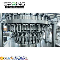 Machine de remplissage de bouteilles en verre et de canettes pour boissons gazeuses, sodas, bières et autres boissons gazeuses au CO2